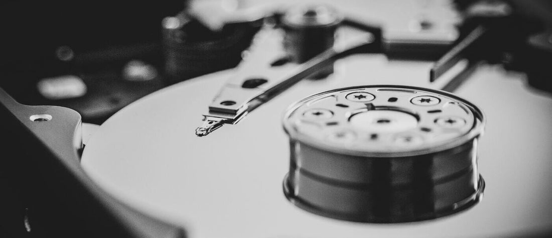 The inner components of a hard disk drive (HDD) including the disk platters and read/write heads.