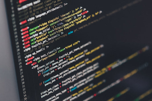 A close-up view of a computer screen displaying colorful PHP code.