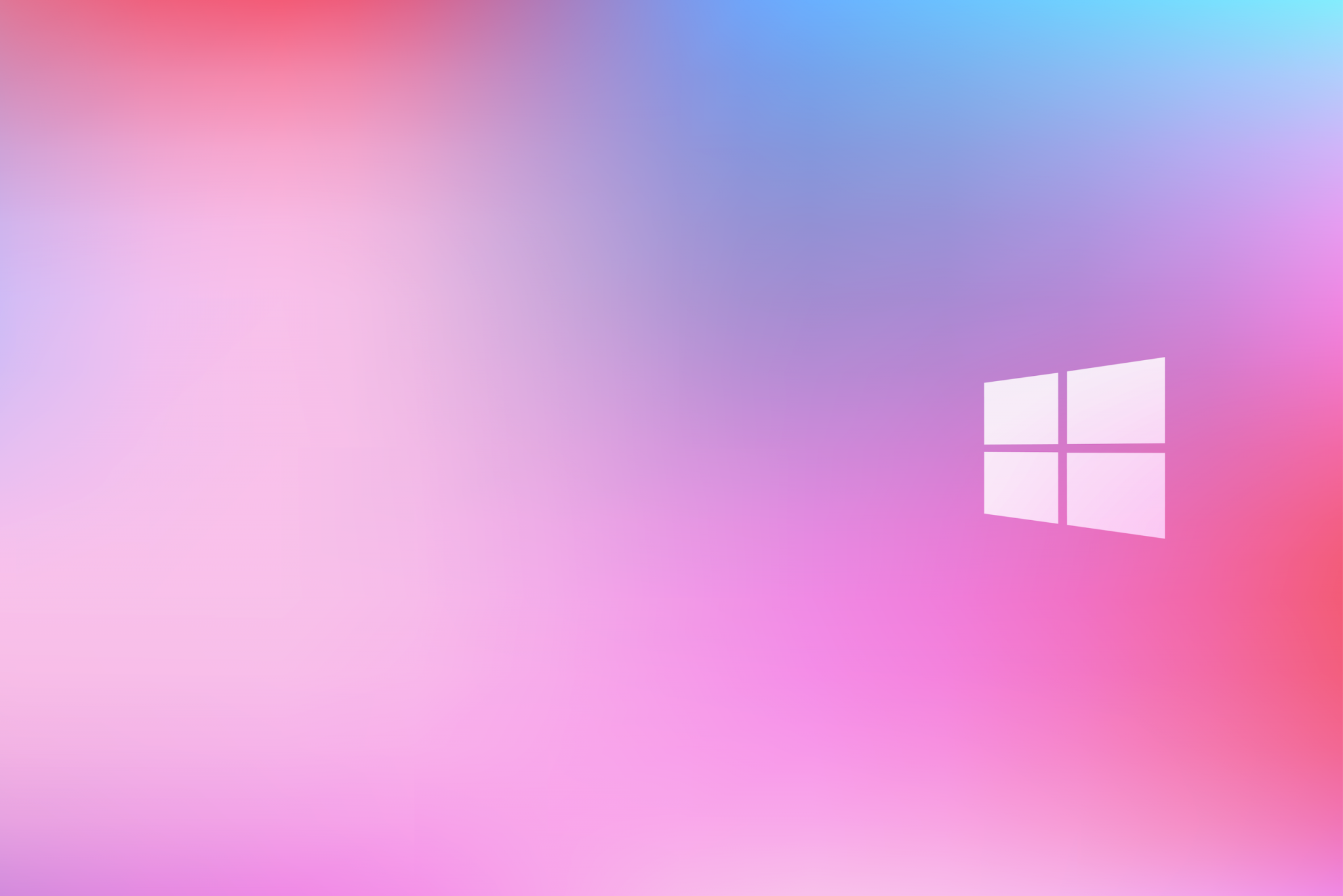 Windows logo on a vibrant gradient background with shades of pink, blue, and red.