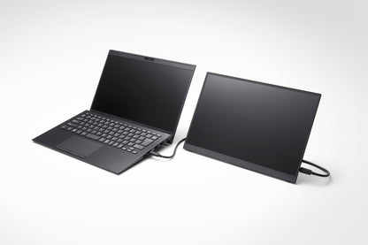 A laptop and a connected external display, demonstrating a dual-screen setup for enhanced productivity.