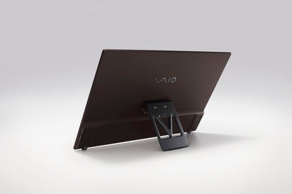 A VAIO monitor with a sleek design, supported by a foldable stand for easy viewing adjustments and portability.